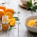 "Create a clean, professional blog header image for an article about Do "Orange Peel Hack" Products Actually Deliver? Include relevant visual elements like supplements, healthy food, or wellness imagery. No text in the image. Horizontal format 1200x628 pixels."